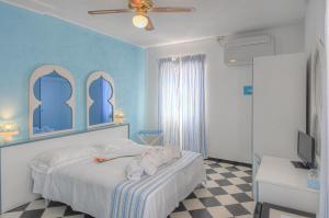 Posteľ alebo postele v izbe v ubytovaní Hotel Arabesque