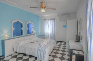 Posteľ alebo postele v izbe v ubytovaní Hotel Arabesque