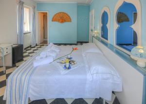 Posteľ alebo postele v izbe v ubytovaní Hotel Arabesque