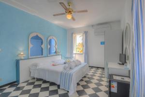 Posteľ alebo postele v izbe v ubytovaní Hotel Arabesque