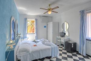Posteľ alebo postele v izbe v ubytovaní Hotel Arabesque