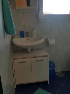 Phòng tắm tại Rooms and Apartments V&M