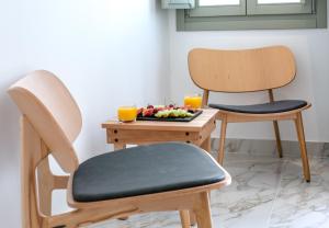 Ein Sitzbereich in der Unterkunft Kallos Imar Boutique Hotel