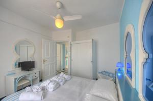 Posteľ alebo postele v izbe v ubytovaní Hotel Arabesque