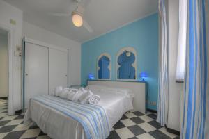 Posteľ alebo postele v izbe v ubytovaní Hotel Arabesque