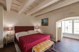 A bed or beds in a room at Residenza d'Epoca Sant Egidio