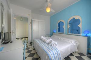 Posteľ alebo postele v izbe v ubytovaní Hotel Arabesque