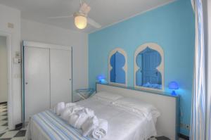 Posteľ alebo postele v izbe v ubytovaní Hotel Arabesque