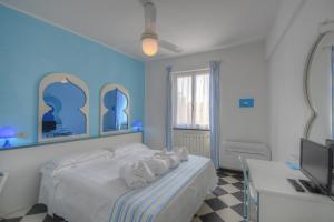 Posteľ alebo postele v izbe v ubytovaní Hotel Arabesque