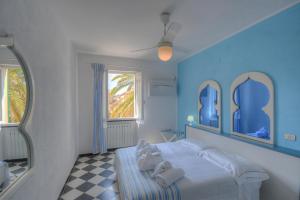 Posteľ alebo postele v izbe v ubytovaní Hotel Arabesque