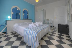 Posteľ alebo postele v izbe v ubytovaní Hotel Arabesque