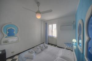Posteľ alebo postele v izbe v ubytovaní Hotel Arabesque