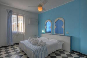 Posteľ alebo postele v izbe v ubytovaní Hotel Arabesque