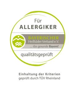 a green and white label for a flyler refrigeratorratorrator at Ferienwohnungen Christine in Bad Staffelstein