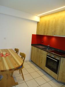 Kuchyň nebo kuchyňský kout v ubytování Haus Holiday
