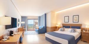 a hotel room with a bed and a desk at SH Villa Gadea in Altea