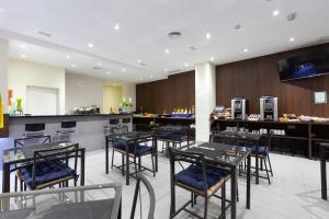 Restaurace v ubytování Hotel Olympia Universidades