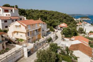 an aerial view of a street in a town with buildings at Apartments Sunny Elza in Hvar