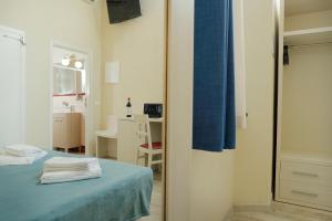 Posteľ alebo postele v izbe v ubytovaní Hotel Il Mulinaccio
