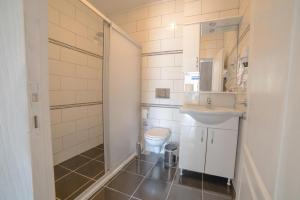 Koupelna v ubytování Madda Hotel