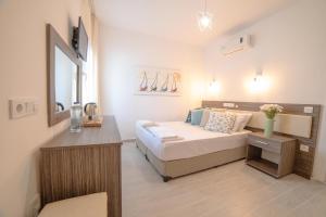 Postel nebo postele na pokoji v ubytování Madda Hotel
