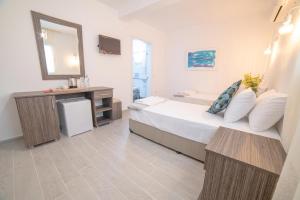 Postel nebo postele na pokoji v ubytování Madda Hotel