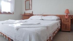Posteľ alebo postele v izbe v ubytovaní Totelya Hotel