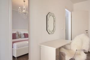 Postel nebo postele na pokoji v ubytování Apartment Epetij 2