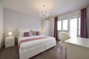 Postel nebo postele na pokoji v ubytování Apartment Epetij 2