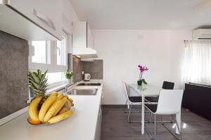 Kuchyň nebo kuchyňský kout v ubytování Apartment Epetij 2
