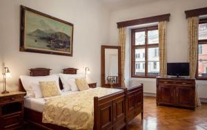 TV a/nebo společenská místnost v ubytování Grand Hotel Praha