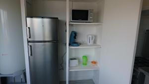Η κουζίνα ή μικρή κουζίνα στο appartement de 79 m² à 500 mètres de la cure