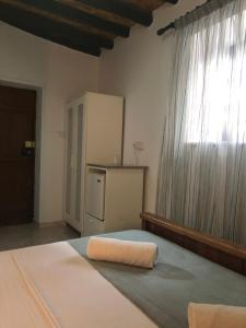 Postel nebo postele na pokoji v ubytování Villa Thermopilon