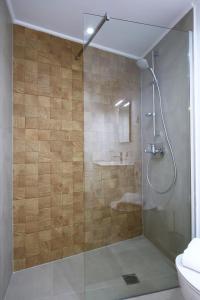 Een badkamer bij Sti Chora Apartments