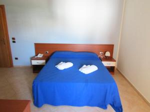 Posteľ alebo postele v izbe v ubytovaní Grand Hostel Calabria