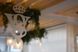 a sign hanging from the ceiling of a room at SH Villa Gadea in Altea