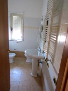 Kúpeľňa v ubytovaní Grand Hostel Calabria