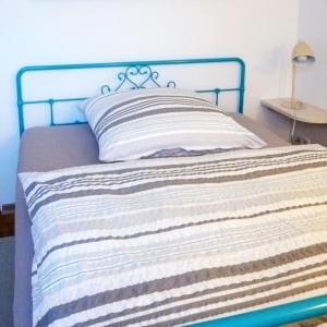 Postel nebo postele na pokoji v ubytování Gästewohnung am Grinderwald