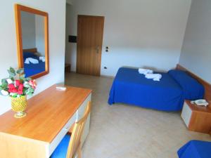 Posteľ alebo postele v izbe v ubytovaní Grand Hostel Calabria