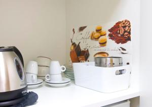 Coffee and tea making facilities at Residence delle Tre Corone