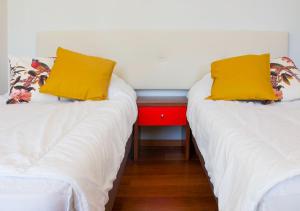A bed or beds in a room at Residence delle Tre Corone