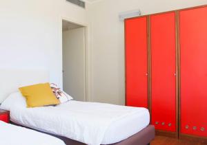 A bed or beds in a room at Residence delle Tre Corone