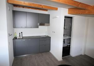 A cozinha ou kitchenette de BeachIN - Sport, Events, Hotel, Restaurant, Bar