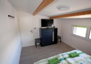 Uma cama ou camas num quarto em BeachIN - Sport, Events, Hotel, Restaurant, Bar