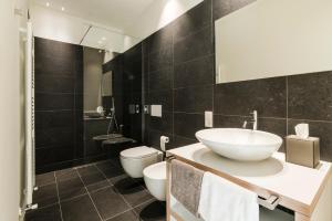 Ένα μπάνιο στο Zum Hirschen Boutique Hotel Val di Non