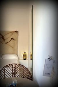 Posteľ alebo postele v izbe v ubytovaní Quintessenza - Charme Rooms