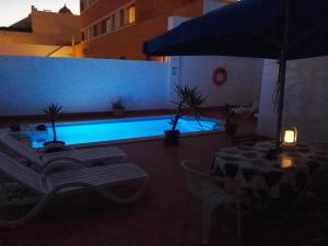 Bazén v ubytování Eureka ! Calle el Roque, urbanización la Caracola. Corralejo, Fuerteventura nebo v jeho okolí