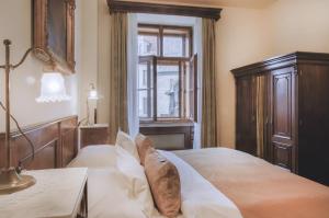 
Ein Bett oder Betten in einem Zimmer der Unterkunft Grand Hotel Praha

