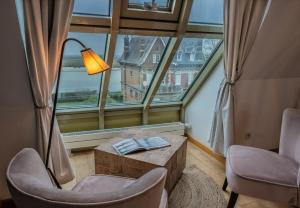 Posezení v ubytování Chambres avec Vue