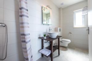 a bathroom with a sink and a toilet at Sea Sky Apartment in Cavtat +14 photos